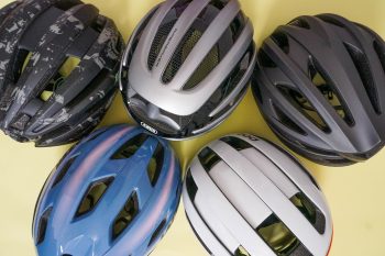 Bike helmets on yellow background